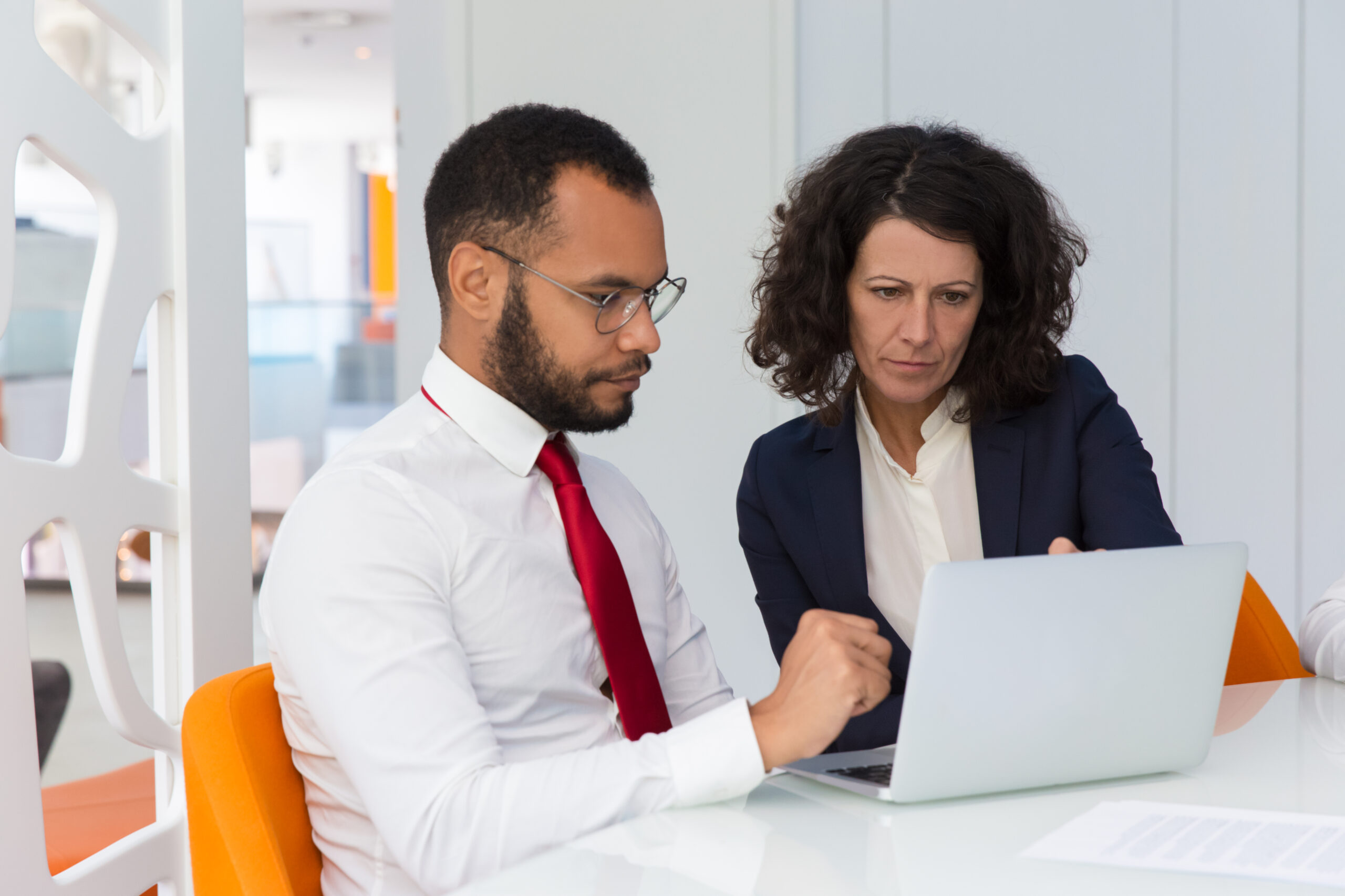 business team of two using computer together
